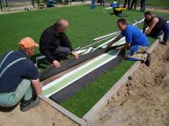 Фото: Обслуживание и ремонт поля с искусственным травяны