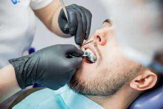 Объявление с Фото - Протезирование в сети стоматологий "Бэлль"
