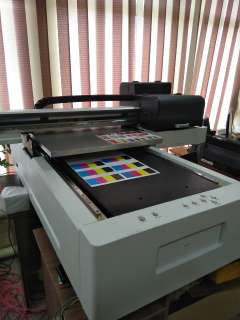 Фото: UV планшетный принтер OPTIMUS 60-90 на трех ТХ800