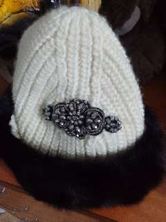 Фото: Женская зимняя шапка с норковой окантовкой